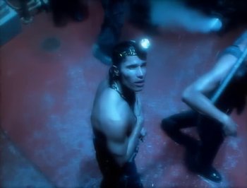 Movie still from “Madonna - Express Yourself” (1989), directed by David Fincher – Medium shot, Overhead angle