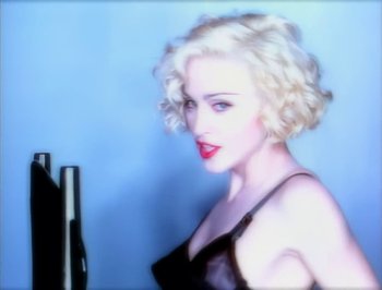 Movie still from “Madonna - Express Yourself” (1989), directed by David Fincher – Close Up shot, Low angle
