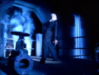 Movie still from “Madonna - Express Yourself” (1989), directed by David Fincher – Medium shot, Low angle