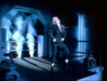 Movie still from “Madonna - Express Yourself” (1989), directed by David Fincher – Medium shot, Low angle
