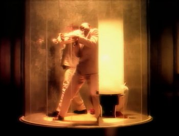 Movie still from “Madonna - Express Yourself” (1989), directed by David Fincher – Wide shot, Overhead angle