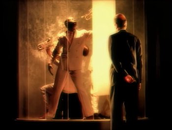 Movie still from “Madonna - Express Yourself” (1989), directed by David Fincher – Medium shot, Low angle