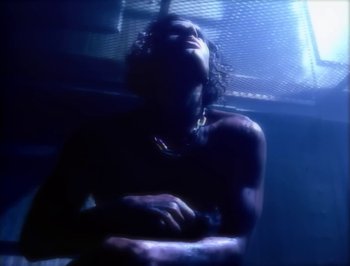 Movie still from “Madonna - Express Yourself” (1989), directed by David Fincher – Extreme Close Up shot, Low angle