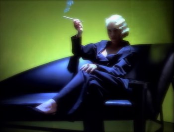 Movie still from “Madonna - Express Yourself” (1989), directed by David Fincher – Medium shot, Low angle
