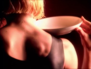 Movie still from “Madonna - Express Yourself” (1989), directed by David Fincher – Extreme Close Up shot, Low angle
