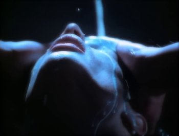 Movie still from “Madonna - Express Yourself” (1989), directed by David Fincher – Extreme Close Up shot, Low angle