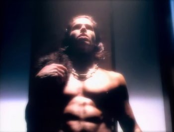 Movie still from “Madonna - Express Yourself” (1989), directed by David Fincher – Extreme Close Up shot, Low angle