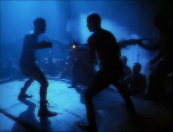 Movie still from “Madonna - Express Yourself” (1989), directed by David Fincher – Wide shot, High angle