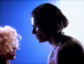 Movie still from “Madonna - Express Yourself” (1989), directed by David Fincher – Extreme Close Up shot, Low angle
