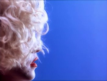 Movie still from “Madonna - Express Yourself” (1989), directed by David Fincher – Extreme Close Up shot, Low angle