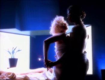 Movie still from “Madonna - Express Yourself” (1989), directed by David Fincher – Extreme Close Up shot, Low angle