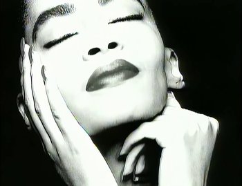 Movie still from “Jody Watley - Real Love” (1989), directed by David Fincher – Extreme Close Up shot, Low angle