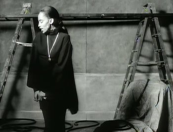 Movie still from “Jody Watley - Real Love” (1989), directed by David Fincher – Medium shot, Low angle