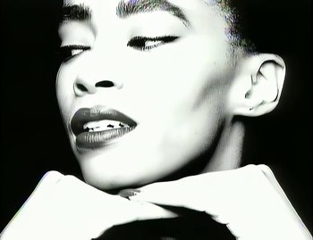 Movie still from “Jody Watley - Real Love” (1989), directed by David Fincher – Extreme Close Up shot, Low angle