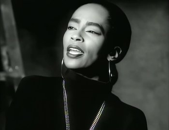 Movie still from “Jody Watley - Real Love” (1989), directed by David Fincher – Close Up shot, Low angle