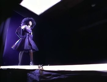 Movie still from “Jody Watley - Real Love” (1989), directed by David Fincher – Wide shot, Low angle