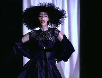 Movie still from “Jody Watley - Real Love” (1989), directed by David Fincher – Medium shot, Low angle