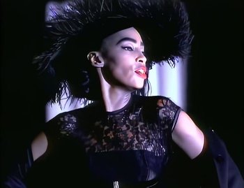 Movie still from “Jody Watley - Real Love” (1989), directed by David Fincher – Close Up shot, Low angle