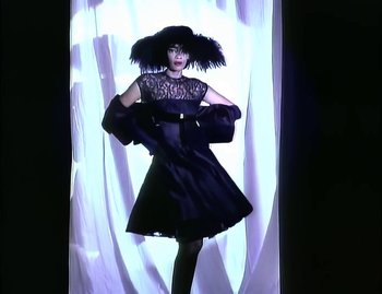 Movie still from “Jody Watley - Real Love” (1989), directed by David Fincher – Medium shot, Low angle