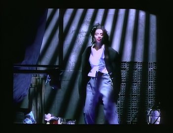 Movie still from “Jody Watley - Real Love” (1989), directed by David Fincher – Medium shot, Low angle