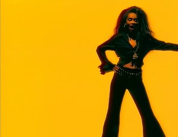 Movie still from “Jody Watley - Real Love” (1989), directed by David Fincher – Medium shot, Low angle