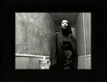 Movie still from “Jody Watley - Real Love” (1989), directed by David Fincher – Medium shot, Low angle