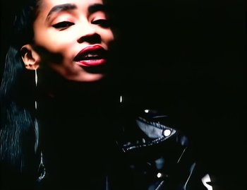 Movie still from “Jody Watley - Real Love” (1989), directed by David Fincher – Extreme Close Up shot, Low angle
