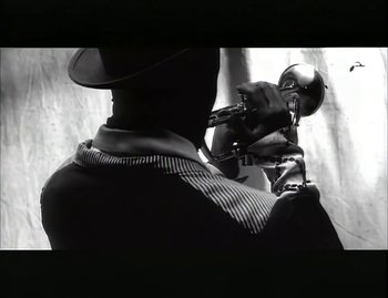 Movie still from “Jody Watley - Real Love” (1989), directed by David Fincher – Extreme Close Up shot, Low angle