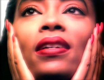 Movie still from “Jody Watley - Real Love” (1989), directed by David Fincher – Extreme Close Up shot, Low angle