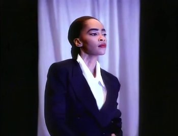 Movie still from “Jody Watley - Real Love” (1989), directed by David Fincher – Medium shot, Low angle