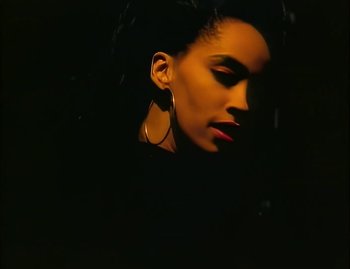 Movie still from “Jody Watley - Real Love” (1989), directed by David Fincher – Close Up shot, High angle
