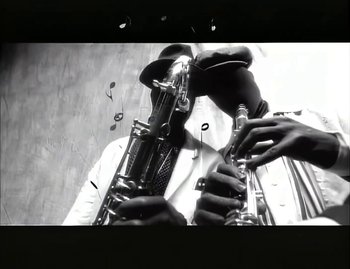 Movie still from “Jody Watley - Real Love” (1989), directed by David Fincher – Extreme Close Up shot, Low angle