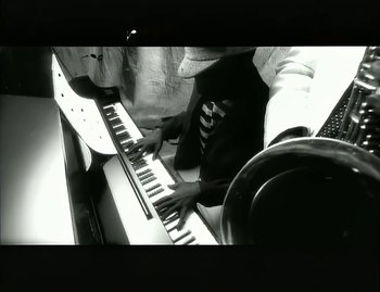 Movie still from “Jody Watley - Real Love” (1989), directed by David Fincher – Extreme Close Up shot, High angle