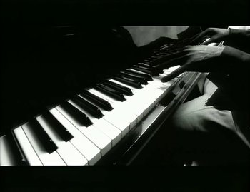 Movie still from “Jody Watley - Real Love” (1989), directed by David Fincher – Extreme Close Up shot, Overhead angle