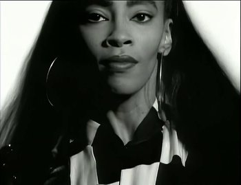 Movie still from “Jody Watley - Real Love” (1989), directed by David Fincher – Close Up shot, Low angle
