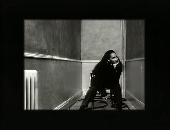 Movie still from “Jody Watley - Real Love” (1989), directed by David Fincher – Medium shot, High angle