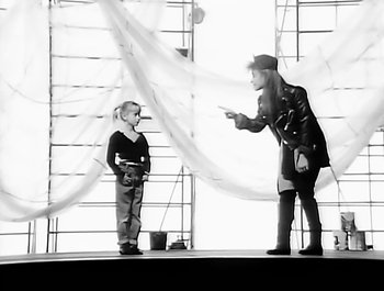 Movie still from “Paula Abdul - Forever Your Girl” (1989), directed by David Fincher – Medium shot, Over the shoulder angle