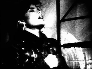 Movie still from “Paula Abdul - Forever Your Girl” (1989), directed by David Fincher – Extreme Close Up shot, Low angle