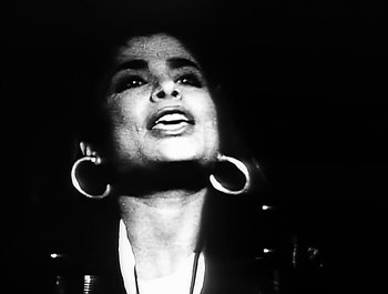 Movie still from “Paula Abdul - Forever Your Girl” (1989), directed by David Fincher – Close Up shot, Low angle