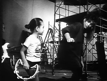 Movie still from “Paula Abdul - Forever Your Girl” (1989), directed by David Fincher – Medium shot, Over the shoulder angle