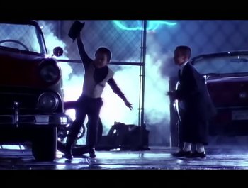 Movie still from “Paula Abdul - Forever Your Girl” (1989), directed by David Fincher – Wide shot, Low angle