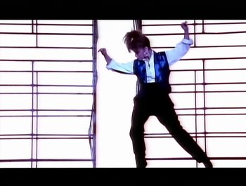 Movie still from “Paula Abdul - Forever Your Girl” (1989), directed by David Fincher – Medium shot, Low angle