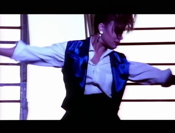 Movie still from “Paula Abdul - Forever Your Girl” (1989), directed by David Fincher – Medium shot, Low angle