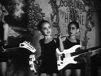 Movie still from “Paula Abdul - Forever Your Girl” (1989), directed by David Fincher – Medium shot, Low angle