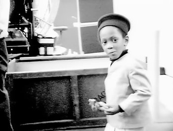 Movie still from “Paula Abdul - Forever Your Girl” (1989), directed by David Fincher – Medium shot, Low angle