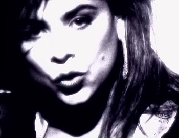 Movie still from “Paula Abdul - Straight Up” (1988), directed by David Fincher – Extreme Close Up shot, High angle