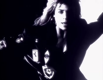 Movie still from “Paula Abdul - Straight Up” (1988), directed by David Fincher – Medium shot, Low angle