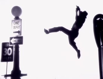 Movie still from “Paula Abdul - Straight Up” (1988), directed by David Fincher – Wide shot, Low angle