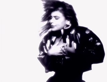 Movie still from “Paula Abdul - Straight Up” (1988), directed by David Fincher – Close Up shot, Low angle