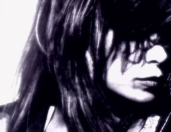 Movie still from “Paula Abdul - Straight Up” (1988), directed by David Fincher – Extreme Close Up shot, Low angle